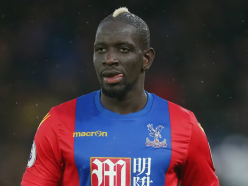 Liverpool defender Sakho sweating on the results of knee scan at Palace