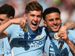 Stones accepts Man City rotation in bid to become world