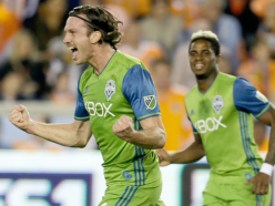 Seattle puts one foot in MLS Cup with 2-0 win over 10-man Houston