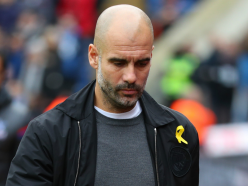 Why does Pep Guardiola wear a yellow ribbon? The meaning behind Man City boss