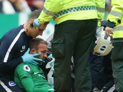 Brighton striker Murray taken to hospital after serious clash of heads