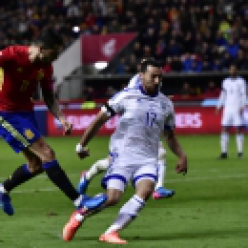Spain and Italy win home games to say in front in Group G (The Associated Press)