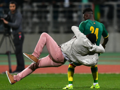 Utter chaos as Ivory Coast vs Senegal match abandoned after fans invade pitch