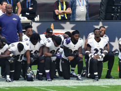 NFL players take a knee at Wembley after criticism from Donald Trump