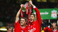 Which players have played for both Manchester United and Liverpool in the Premier League era?